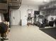 Organized home gym with various exercise equipment at 5046 Avalon Park Blvd, Wesley Chapel, FL 33545