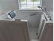 Walk-in bathtub with jets and easy access at 13 Pebble Beach Rd, Rotonda West, FL 33947