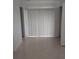 Bedroom with sliding door and window blinds at 13 Pebble Beach Rd, Rotonda West, FL 33947
