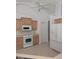 Bright kitchen with ample cabinetry and modern appliances at 13 Pebble Beach Rd, Rotonda West, FL 33947