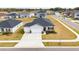 Aerial view of a house and surrounding neighborhood at 9415 Pinewood Point Pl, Seffner, FL 33584