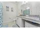 Clean bathroom with granite countertop and shower at 9415 Pinewood Point Pl, Seffner, FL 33584