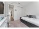 Cozy bedroom with daybed and access to hallway at 9415 Pinewood Point Pl, Seffner, FL 33584