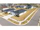 Well-manicured lawn surrounds this single-Gathering home in a quiet neighborhood with sidewalks and lush grass at 9415 Pinewood Point Pl, Seffner, FL 33584