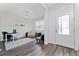 Bright home office with desk and seating at 9415 Pinewood Point Pl, Seffner, FL 33584
