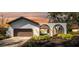 Stunning ranch home with unique architectural details and landscaping at 4907 Parson Brown Ln, Palm Harbor, FL 34684