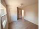 Spacious bedroom with wood-look floors and ceiling fan at 5809 N 17Th St, Tampa, FL 33610