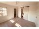 Bright bedroom with hardwood floors and barn door at 5809 N 17Th St, Tampa, FL 33610