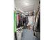 Spacious walk-in closet with shelving and ample storage space, perfect for organizing your wardrobe at 6594 Fairway Gardens Dr # 6594, Bradenton, FL 34203