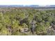 Aerial shot of home, surrounded by a forest setting at 13107 Texel Ave, New Port Richey, FL 34654