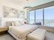 Main bedroom with a waterfront view and modern accents at 900 N Osceola Ave # 703, Clearwater, FL 33755