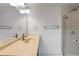 Clean bathroom with a vanity, mirror, and shower at 8514 N Mitchell Ave, Tampa, FL 33604