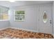 Bright entryway with tile floors and an updated door at 8514 N Mitchell Ave, Tampa, FL 33604