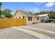 Well-maintained bungalow with a fenced yard and double driveway at 8514 N Mitchell Ave, Tampa, FL 33604