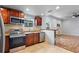 Updated kitchen, granite countertops, stainless steel appliances and breakfast bar at 8514 N Mitchell Ave, Tampa, FL 33604