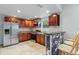 Modern kitchen with granite countertops and stainless steel appliances at 8514 N Mitchell Ave, Tampa, FL 33604