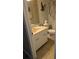 Simple bathroom with a single sink vanity, toilet and shower/tub at 721 Plumbrook Rd, Sun City Center, FL 33573