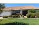 Single-story home with tile roof, landscaped yard, and attached garage at 721 Plumbrook Rd, Sun City Center, FL 33573