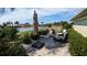 Relaxing patio overlooking a lake, perfect for outdoor enjoyment at 721 Plumbrook Rd, Sun City Center, FL 33573
