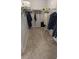 Large walk-in closet with ample shelving and hanging space at 721 Plumbrook Rd, Sun City Center, FL 33573