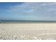 Expansive beach with person in distance at 15810 2Nd E St, Redington Beach, FL 33708