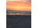 Stunning sunset over the ocean and sandy beach at 15810 2Nd E St, Redington Beach, FL 33708