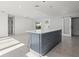 Open concept kitchen featuring a large island at 15810 2Nd E St, Redington Beach, FL 33708