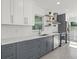 Contemporary kitchen with marble countertops and stainless steel appliances at 15810 2Nd E St, Redington Beach, FL 33708