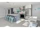 Modern kitchen with stainless steel appliances and an island at 15810 2Nd E St, Redington Beach, FL 33708