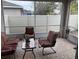 Screened patio with seating area, ideal for relaxing outdoors at 8115 Alamosa Wood Ave, Ruskin, FL 33573