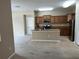 Updated kitchen featuring granite countertops and ample cabinet space at 8115 Alamosa Wood Ave, Ruskin, FL 33573