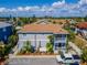 Aerial view of a two-story building with brown roof and parking at 1013 Apollo Beach Blvd # 202, Apollo Beach, FL 33572