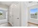 Bright hallway with two closets and wood flooring at 2607 N 21St St, Tampa, FL 33605