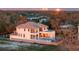Luxury waterfront home with a pool and city skyline view at 5032 W Longfellow Ave, Tampa, FL 33629