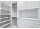 Large walk-in closet with ample shelving and hanging space at 5032 W Longfellow Ave, Tampa, FL 33629