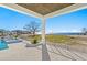 Covered patio overlooking the pool and waterfront at 5032 W Longfellow Ave, Tampa, FL 33629
