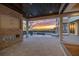 Outdoor patio with fireplace and sunset view at 5032 W Longfellow Ave, Tampa, FL 33629