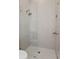 Large walk-in shower with modern fixtures at 5032 W Longfellow Ave, Tampa, FL 33629