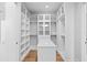 Spacious walk-in closet with ample shelving and hanging space at 5032 W Longfellow Ave, Tampa, FL 33629