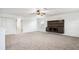 Spacious bonus room with neutral carpeting and built-in entertainment center at 605 19Th Nw St, Ruskin, FL 33570