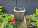 Outdoor air conditioning unit situated near vibrant hibiscus flowers at 1006 39Th W Ave, Bradenton, FL 34205