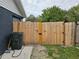 Large backyard with wooden fence and storage shed at 1006 39Th W Ave, Bradenton, FL 34205
