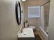 Clean bathroom with updated vanity and bathtub at 1006 39Th W Ave, Bradenton, FL 34205
