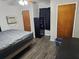 Spacious bedroom with wood-look floors and ample closet space at 1006 39Th W Ave, Bradenton, FL 34205