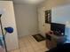 An inside bedroom with a white door and a TV at 1006 39Th W Ave, Bradenton, FL 34205