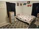 bedroom with Minnie Mouse bedding and built-in shelving at 1006 39Th W Ave, Bradenton, FL 34205