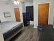 Spacious bedroom with a safe and window A/C unit at 1006 39Th W Ave, Bradenton, FL 34205