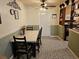 Bright dining area with table and chairs, open to kitchen at 1006 39Th W Ave, Bradenton, FL 34205