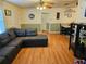 Spacious living room with hardwood floors and a comfy sectional sofa at 1006 39Th W Ave, Bradenton, FL 34205