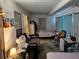 Multi-use sunroom with ample space for seating and sleeping at 1006 39Th W Ave, Bradenton, FL 34205